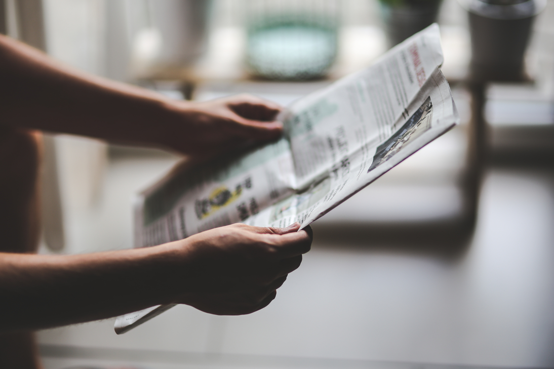 Man reading news paper